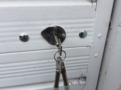 Enfield garage door bolts fitted to an up-and-over garage door by Pentland Locksmiths to provide extra security in Edinburgh and Midlothian.