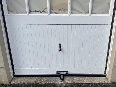 old Secure garage door defender fitted to a garage in Edinburgh by Pentland Locksmiths to prevent forced entry and improve security.