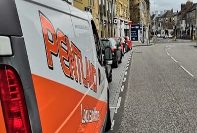 Pentland Locksmiths branded van parked on Dalkeith High Street in Midlothian, showing local locksmith service presence in the town.
